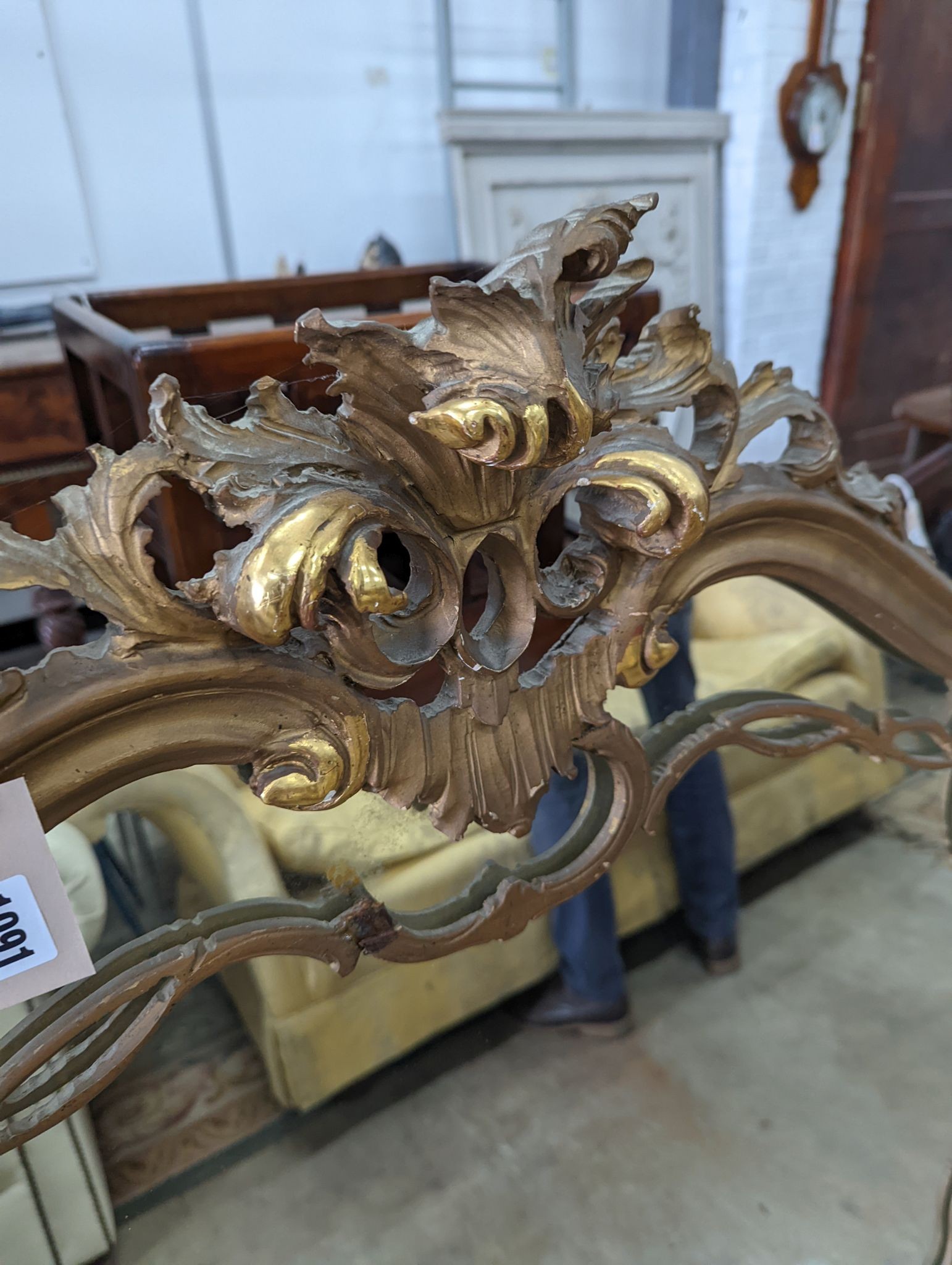 A Victorian style carved giltwood overmantel mirror, width 140cm, height 125cm